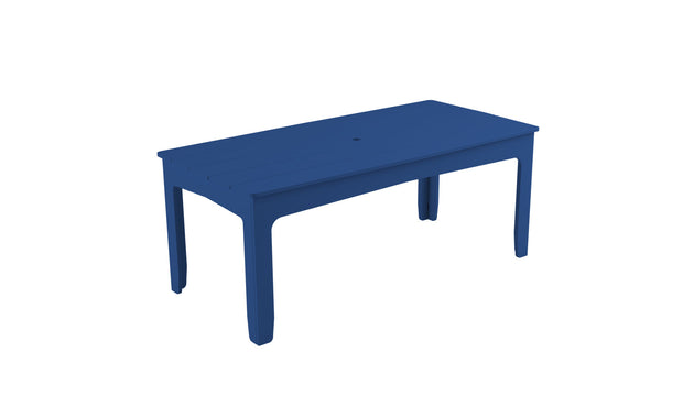 The Mainstay Rectangular Dining Table by Ledge Lounger features a minimalist design with four slightly tapered legs and a central hole for an umbrella sleeve, making its smooth, flat surface perfect for outdoor dining.
