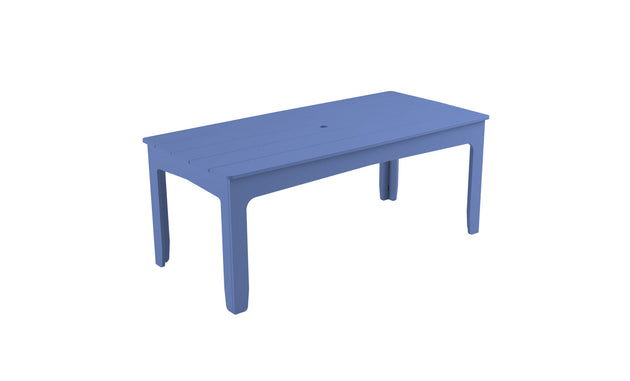The Ledge Lounger Mainstay Rectangular Dining Table, a blue plastic design with a slatted top and four legs, features a central circular umbrella sleeve. Ideal for outdoor dining, it blends functionality with style.