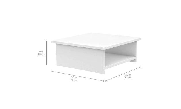 The Echo Side Table by Ledge Lounger is a white wooden riser, 8 inches tall and 20 inches long and wide, featuring a minimalistic design with a rectangular base and an open shelf perfect for patio essentials.