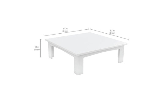 The Mainstay Sectional Relaxed Endcap by Ledge Lounger is a white square coffee table, ideal for relaxing, measuring 32 inches (81 cm) per side and 12 inches (30 cm) high. Its simple straight legs and smooth surface blend effortlessly with any indoor or outdoor space.