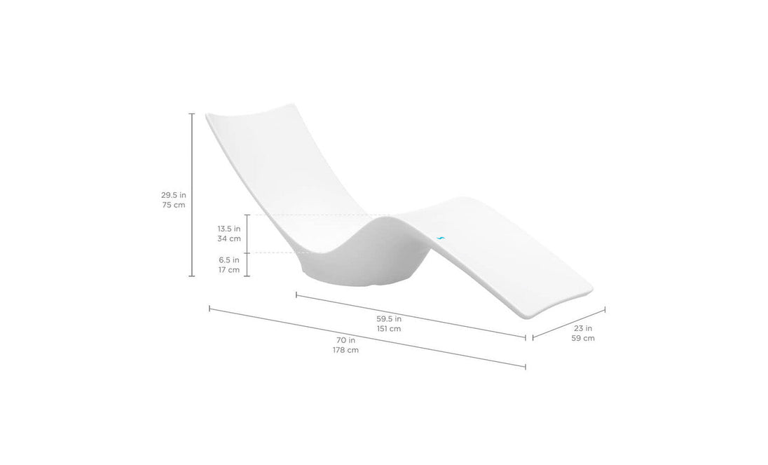Elevate your indoor or outdoor space with the Autograph Chaise by Ledge Lounger. This modern white lounge chair boasts a sleek, wavy design, ensuring the ultimate lounging experience through perfect comfort and style.