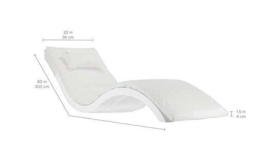 The Signature Chaise Cushion by Ledge Lounger is a modern white lounge chair with a wavy design and cozy cushion, measuring 22 inches wide, 80 inches long, and 15 inches high. It includes a headrest pillow for ultimate relaxation.