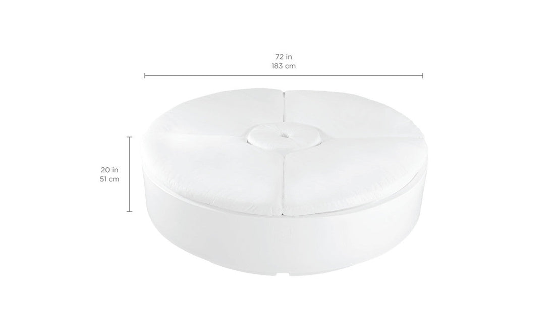 Introducing the Signature Round Sunbed by Ledge Lounger—a spacious, round white ottoman ideal for outdoor relaxation. With a tufted center and stitched sections, it measures 72 in diameter and 20 in height, providing a smooth, cushioned surface for ultimate comfort.