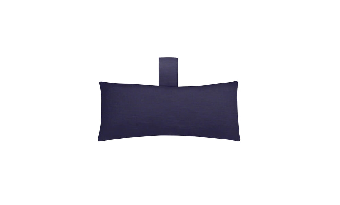 The Ledge Lounger Autograph Headrest Pillow in navy marine-grade fabric includes a short loop handle at the top center, ideal for poolside relaxation, with its elegant design contrasting against a white background.