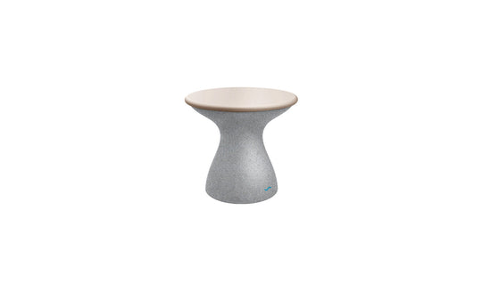 The Autograph Standard Side Table by Ledge Lounger is gray with a sleek light beige top, featuring a modern hourglass design perfect for poolside storage. Its minimalist curved waist effortlessly blends style and functionality against a white background.