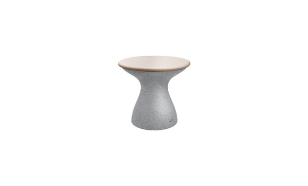 The Autograph Standard Side Table by Ledge Lounger is gray with a sleek light beige top, featuring a modern hourglass design perfect for poolside storage. Its minimalist curved waist effortlessly blends style and functionality against a white background.