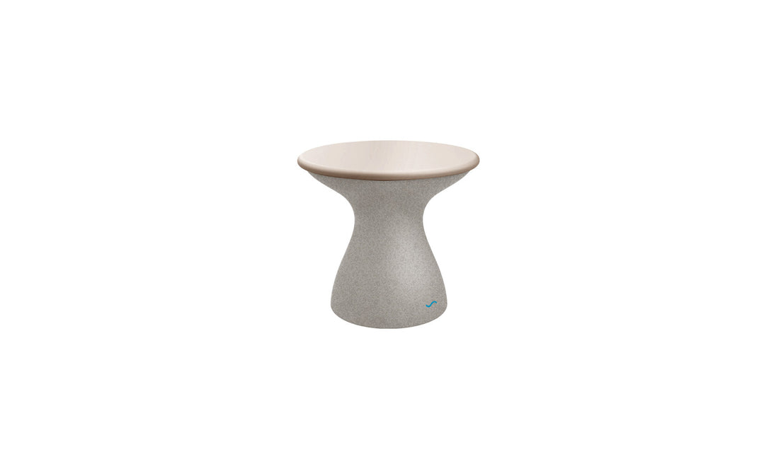 The Autograph Standard Side Table by Ledge Lounger features a tall, hourglass design with a smooth, beige top and textured gray base, making it the perfect elegant addition for poolside decor.