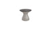The Ledge Lounger Autograph Standard Side Table is a sleek, modern piece with a smooth hourglass-shaped base and round top. Its light gray, textured surface features a slight sheen, making it perfect for elegant poolside storage.