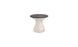 The Autograph Standard Side Table by Ledge Lounger is a modern outdoor side table with an hourglass shape, sleek gray top, and smooth white base. The base includes a subtle blue logo near the bottom, making it perfect for poolside storage or any stylish setting.