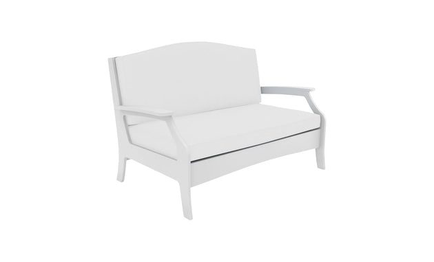 Introducing the Ledge Lounger Legacy Loveseat, a white wooden two-seater bench with armrests and a high backrest, offering cushioned comfort atop its minimalist design that enhances any outdoor space.