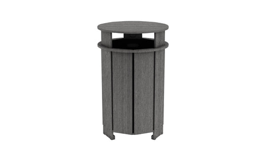 The Mainstay Trash Bin by Ledge Lounger is a tall, cylindrical wooden trash can with vertical planks. It features a dark gray finish and an open top for easy disposal.