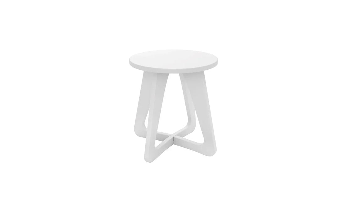 The Ledge Lounger Mainstay Stool is a small, modern white side table with a round top and geometric intersecting legs, ideal as a chic patio stool or accent piece. Shown on a plain white background.