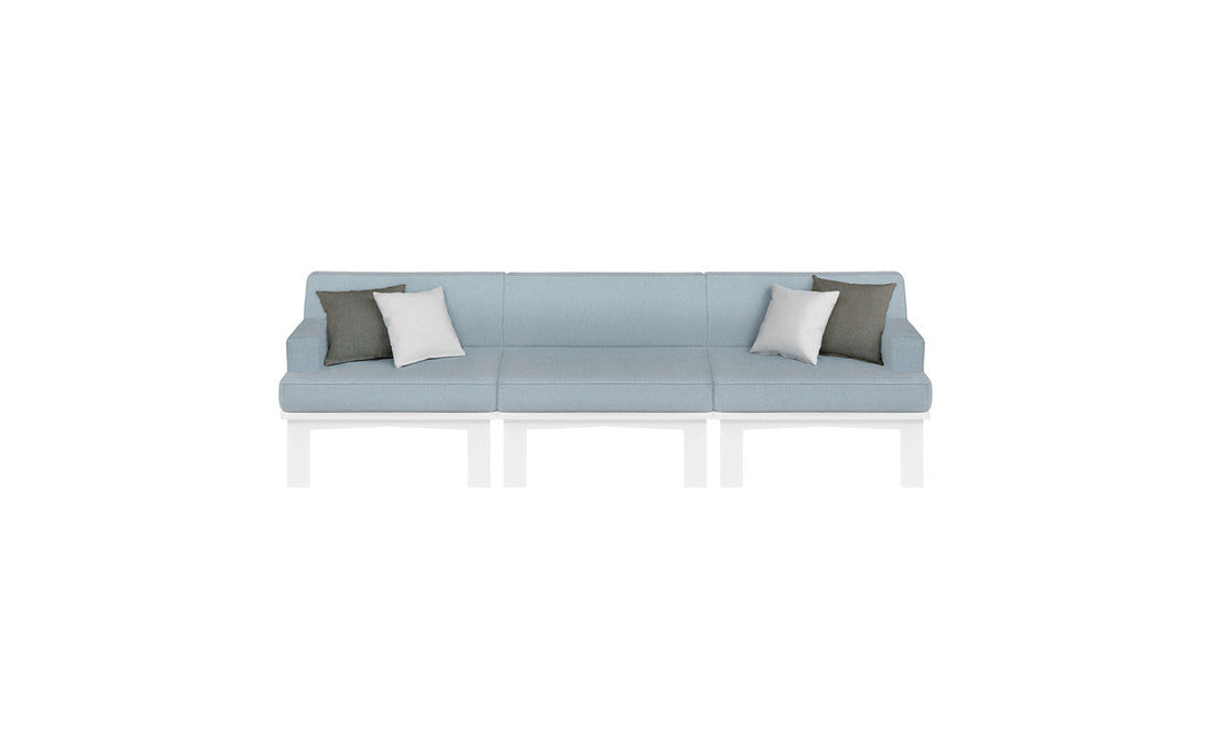 The Mainstay Sectional 3 Piece Sofa by Ledge Lounger is a long, light blue minimalist outdoor sectional set. It includes three sections and comes with two white and two gray throw pillows, styled for comfort against a plain white background.