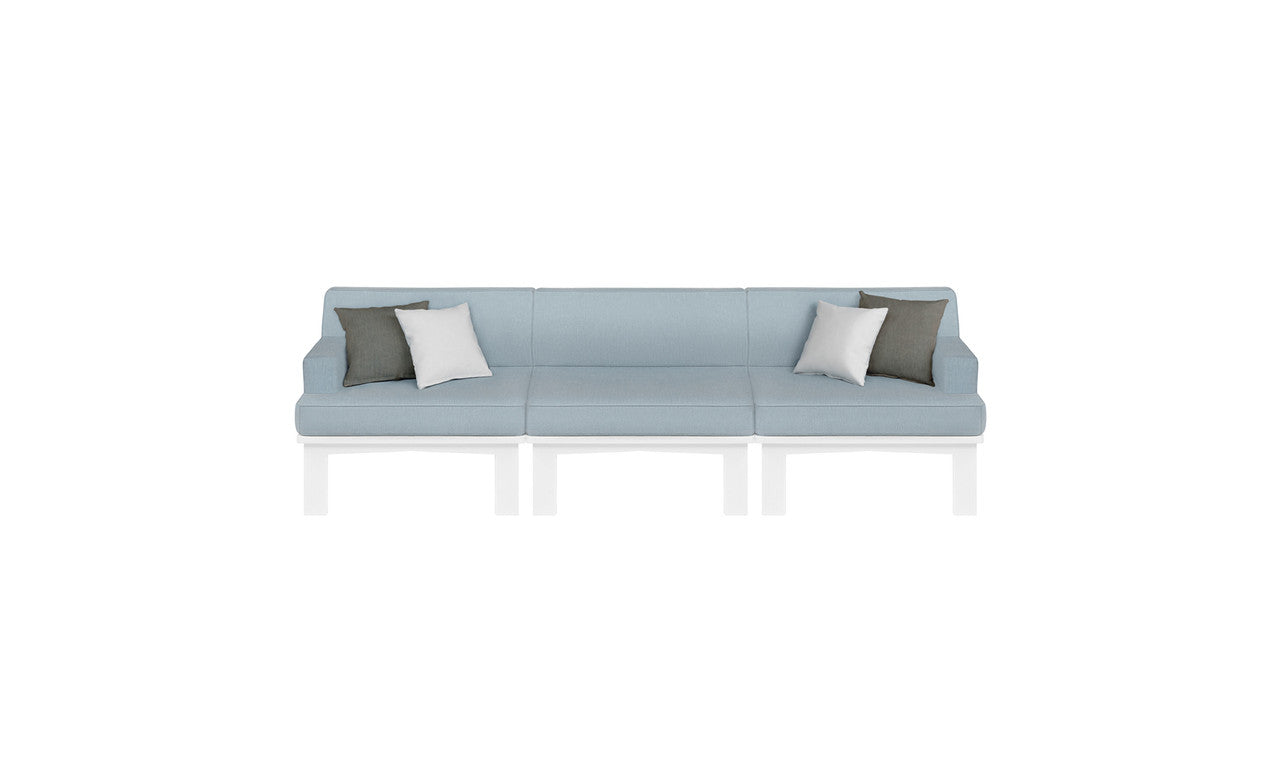 The Mainstay Sectional 3 Piece Sofa by Ledge Lounger is a long, light blue minimalist outdoor sectional set. It includes three sections and comes with two white and two gray throw pillows, styled for comfort against a plain white background.
