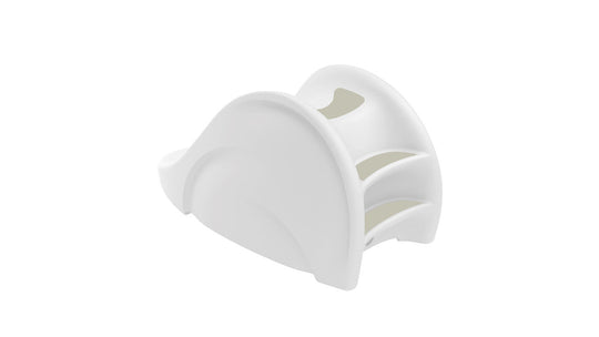 The Ledge Lounger Signature Slide is a chic and functional poolside accessory with a modern, white curved design featuring three arched slots for napkins. It enhances any table setting with elegance against a plain white background.