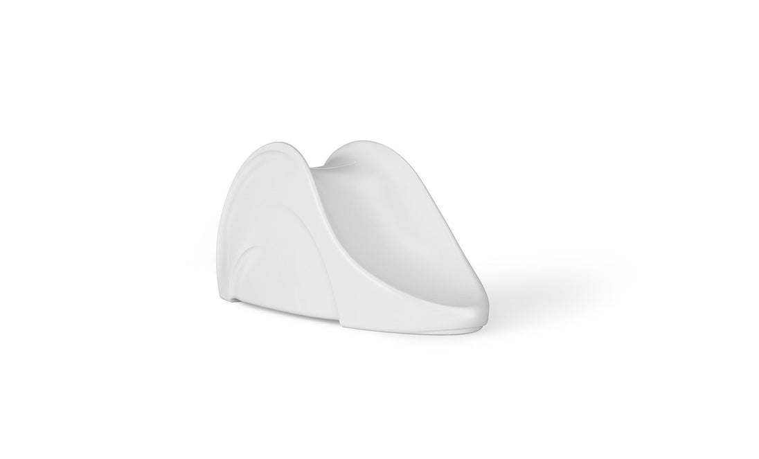 The Signature Slide by Ledge Lounger is a sleek, white shoe display stand with a modern curved design. It elegantly showcases a single shoes heel and sole with a smooth, glossy finish, ideal for highlighting footwear elegance.