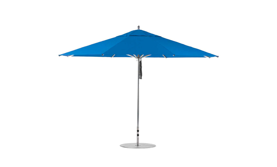 The Ledge Lounger Premier Aluminum Umbrella - 13 Octagon Pulley boasts a blue canopy with a silver pole and round base, featuring a sleek, modern design. Crafted from high-quality materials, its known for superior durability and wind resistance in outdoor settings.