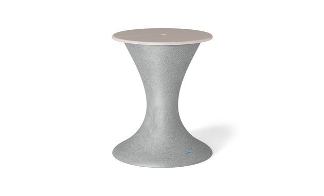 The Autograph Umbrella Stand Ice Bin by Ledge Lounger features a sleek, hourglass design with a textured gray base and smooth beige seat, blending modern aesthetics with functionality, ideal for contemporary interiors.