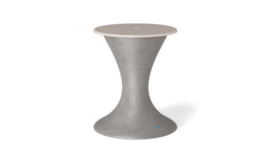 The Autograph Umbrella Stand Ice Bin by Ledge Lounger, featuring a tall, hourglass design with a gray speckled body and light beige top, serves as an elegant outdoor table or stool to enhance any patio setup.