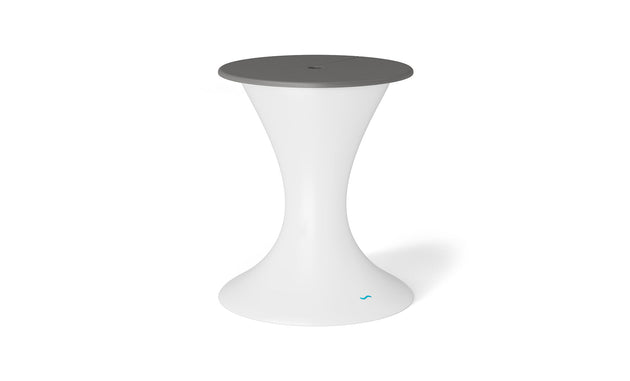 The Autograph Umbrella Stand Ice Bin by Ledge Lounger is a sleek, modern piece with an hourglass shape and a dark gray circular top. Its ideal for outdoor use, offering stability with its wider base and featuring a subtle logo near the bottom for an elegant touch.