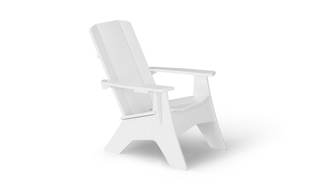 The Mainstay Ultimate Adirondack by Ledge Lounger is a sleek white chair with a minimalist aesthetic, featuring wide armrests and a slanted back, perfect for outdoor lounging.