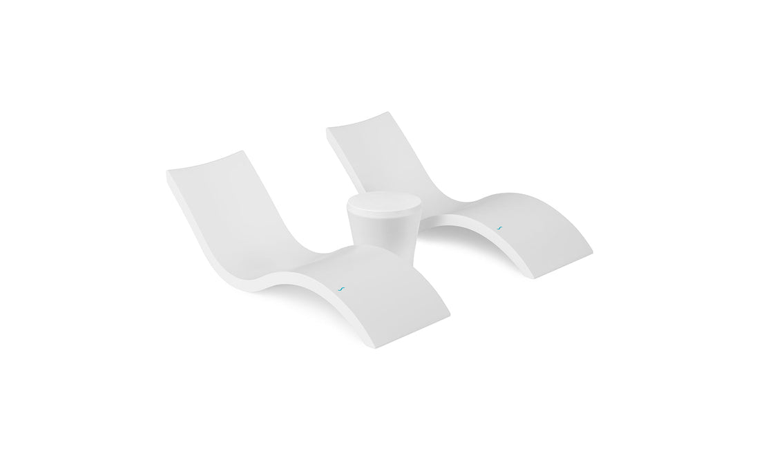 The Ledge Lounger Signature Chaise and Affinity Side Table In-Pool Set features two modern white chaise loungers with curved designs placed side by side, separated by the matching side table, all on a plain white background.