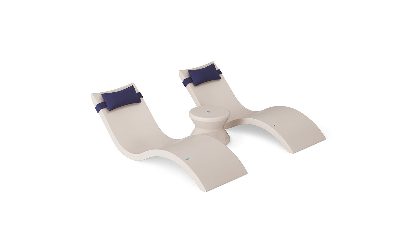 The Ledge Lounger Signature Chaise Headrest Pillow and Side Table In-Pool Set features two modern beige chaises with navy headrests, joined by a round table, all displayed against a white background.