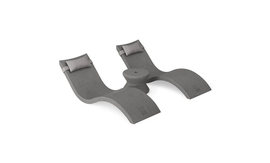The Ledge Lounger Signature Chaise Headrest Pillow and Side Table In-Pool Set features two modern gray chaise loungers with light gray headrests and a round side table, offering a sleek, stylish addition to your pool ledge.
