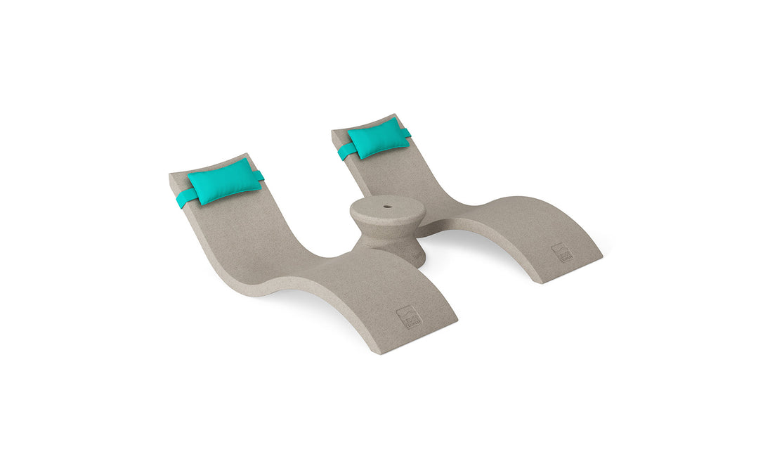 The Ledge Lounger Signature Chaise Headrest Pillow and Side Table In-Pool Set features two beige curved loungers with built-in aqua blue headrests connected by a round side table, ideal for enhancing your outdoor paradise. Shown on a plain white background.