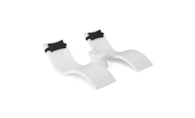 The Ledge Lounger Signature Chaise Headrest Pillow and Side Table In-Pool Set features two modern white loungers with black headrests and a round center table—perfect for relaxing in style by the pool and elevating your outdoor space.