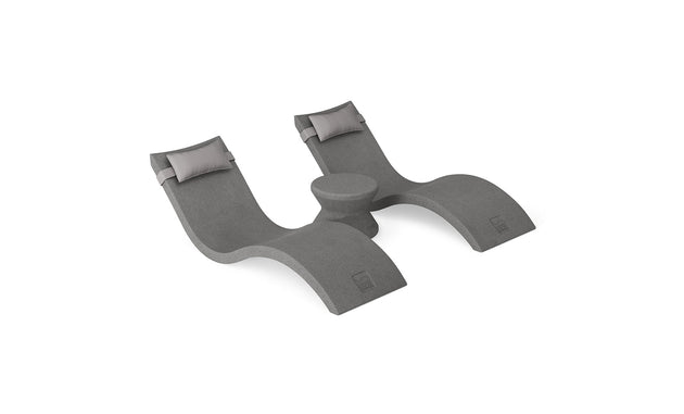 The Ledge Lounger Signature Chaise Headrest Pillow and Side Table In-Pool Set includes two modern gray chaises with headrests and a side table, perfect for relaxing on your pool ledge and enhancing your outdoor space.