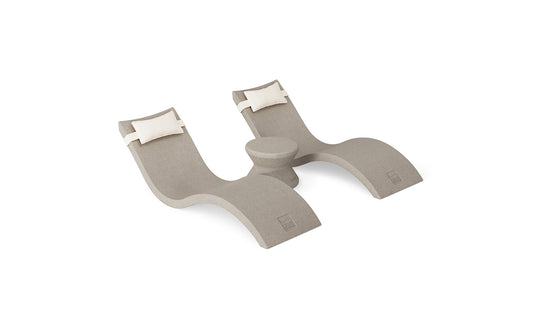 The Ledge Lounger Signature Chaise Headrest Pillow and Side Table In-Pool Set features two beige loungers with white headrest pillows and a round side table, perfect for relaxing poolside, all displayed on a plain white background.
