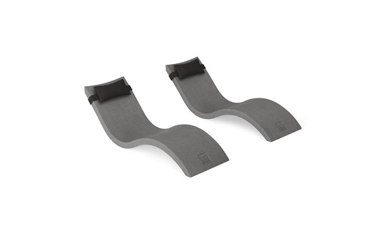 The Ledge Lounger Signature Chaise and Headrest Pillow In-Pool Set features two modern gray, wave-shaped loungers with built-in headrest pillows, shown on a white background.