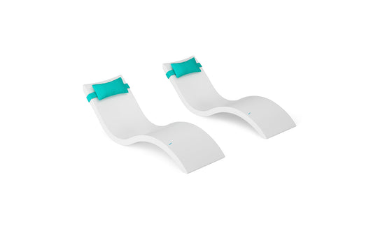 The Ledge Lounger Signature Chaise and Headrest Pillow In-Pool Set includes two modern white chaises with smooth curves and turquoise headrests, shown side by side on a white background—ideal for stylish outdoor spaces.