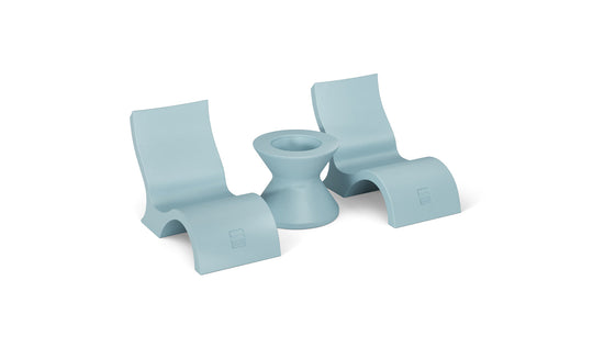 The Relaxation In-Pool Chair & Ice Bin Bundle - Lowback by Ledge Lounger includes two ergonomic light blue chairs with curved bases and a matching hourglass-shaped side table, offering modern style and functionality against a white background.