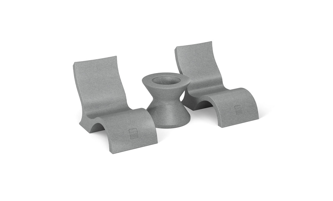 The Ledge Lounger Relaxation In-Pool Chair & Ice Bin Bundle - Lowback, featuring two ergonomically designed gray rocking lounge chairs and an hourglass-shaped table, offers a sleek, modern look ideal for contemporary spaces.