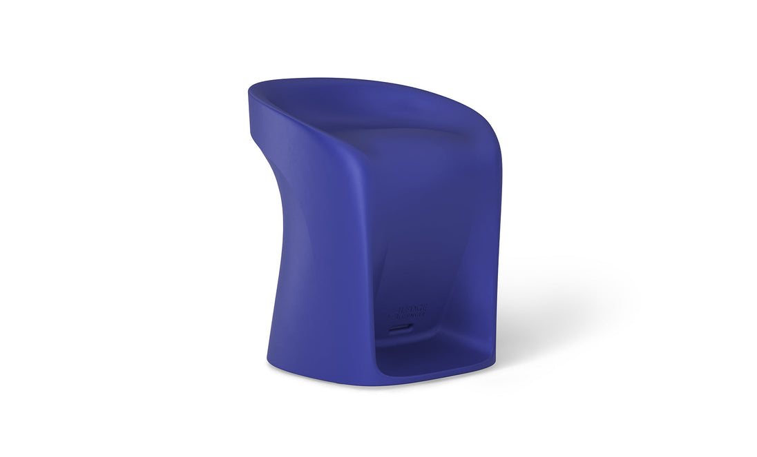 The Signature Barstool Counter Height by Ledge Lounger is a modern, abstract blue chair featuring smooth, sculptural curves. Its rounded backrest and integrated seat offer a seamless look, while the slightly tapered, stable base makes it ideal for chic pool bar settings.