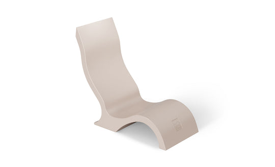 The Signature Chair by Ledge Lounger is a modern, sculptural beige outdoor chair featuring an armless, high backrest and wave-shaped seat that elegantly curves into the base. Its sleek design embodies minimalist elegance on a white background.