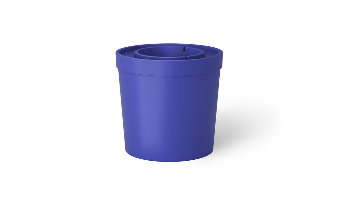 The Ledge Loungers Signature Ice Basin is a blue cylindrical plastic container with a removable lid and internal strainer, resembling a beverage cooler, set against a plain white background.