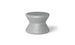 The Signature Standard Side Table by Ledge Lounger is a gray hourglass-shaped stool with a textured surface and smooth, curved design, perfect for in-pool use. The name BLØK is subtly engraved near the base, set against a plain white background.