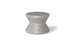 The Signature Standard Side Table by Ledge Lounger is a gray hourglass-shaped stool with a smooth surface, ideal for in-pool use. It complements any sun shelf setting and is set against a plain white background.