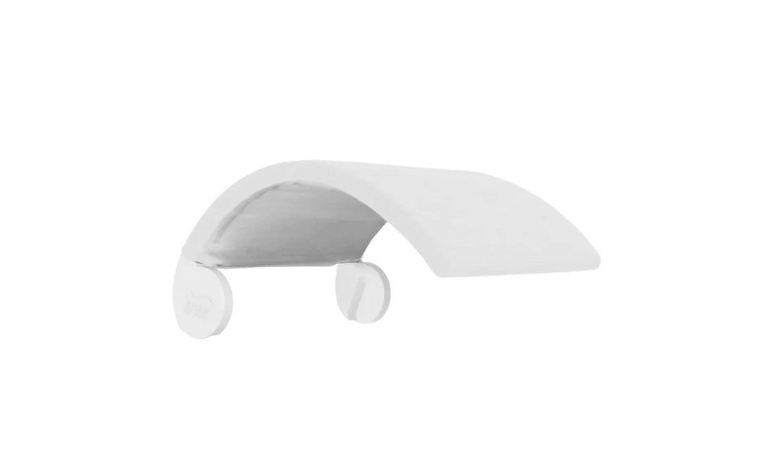 The Signature Chair Shade by Ledge Lounger is a minimalist, modern white table lamp with a curved, arch-like design. Its flat, elongated top and dual cylindrical bases enhance the sleek look of any in-pool tanning ledge or Signature Chair lounger with contemporary elegance.
