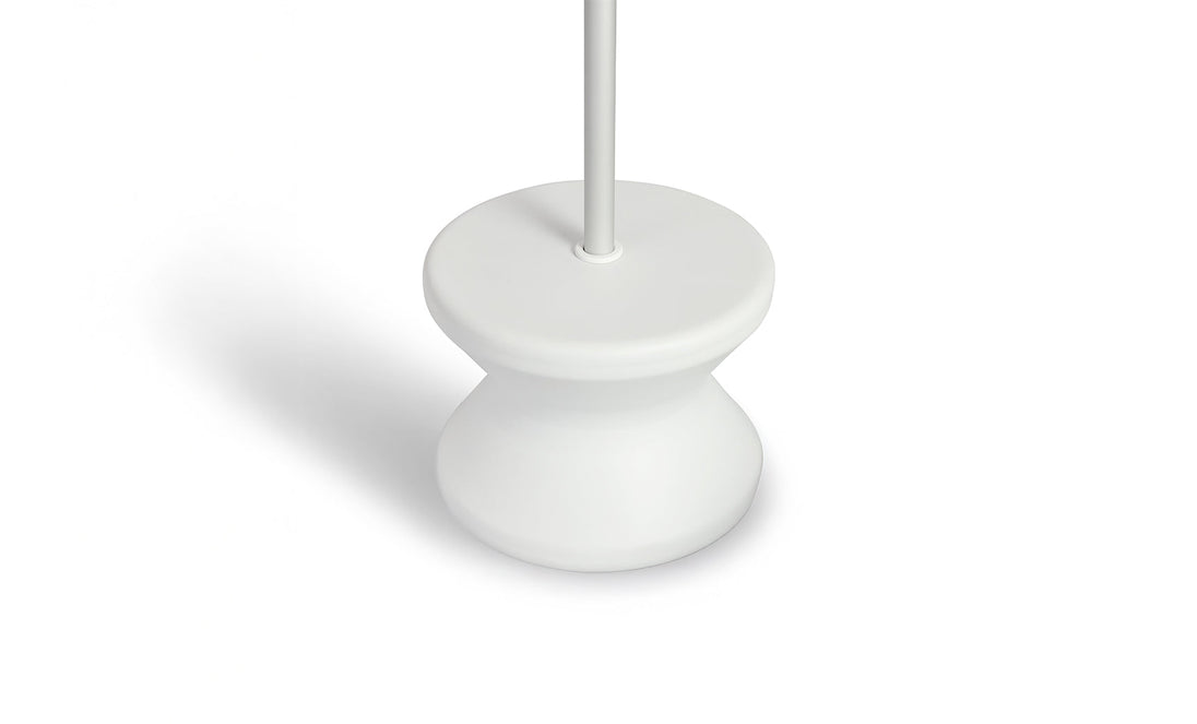 The Ledge Lounger Signature Standard Side Table showcases a close-up of its white, curved pedestal base with an upward pole. Perfect for in-pool use, it boasts a minimalist design casting a soft shadow on the white background, reminiscent of a tranquil sun shelf.