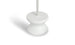 The Ledge Lounger Signature Standard Side Table showcases a close-up of its white, curved pedestal base with an upward pole. Perfect for in-pool use, it boasts a minimalist design casting a soft shadow on the white background, reminiscent of a tranquil sun shelf.