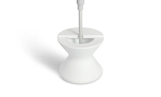 The Signature Tall Ice Bin Side Table by Ledge Lounger has a sleek, modern white design resembling an umbrella base. Its minimalist look features a smooth finish, while its hourglass shape adds elegance against a plain white background.