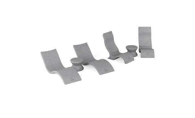 The Ledge Lounger Signature Chaise with Chairs and Side Table In-Pool 6-Piece Set features four sleek gray lounge chairs and two round side tables in a modern, minimalist style, perfect for resort-inspired poolside relaxation.