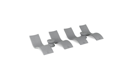 The Ledge Lounger Signature Chaise and Side Table In-Pool 6-Piece Set features three identical gray, modern chaise loungers with curved arches, arranged side by side on a white background, evoking minimalist poolside luxury.