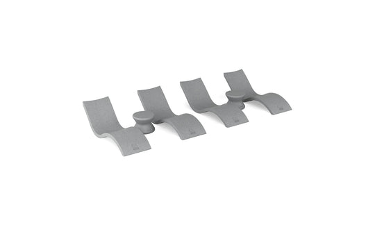 The Ledge Lounger Signature Chaise and Side Table In-Pool 6-Piece Set features modern, minimalist gray pieces with curved, wave-like designs, arranged side by side on a white background.