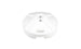 A white, circular object with radial ridges and a central hole is set against a plain background, resembling tranquility akin to an outdoor dining space. This is the Resin Coated Concrete Umbrella Base by Ledge Lounger.