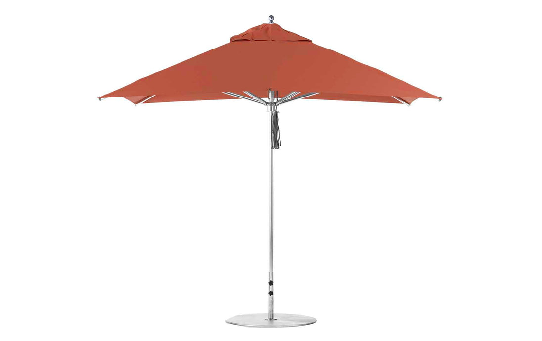 The Premier Aluminum Umbrella by Ledge Lounger, featuring a silver pole and round base, is a front-view 10 square umbrella in red. Crafted from marine-grade fabrics, it offers wind resistance and a sleek modern design.